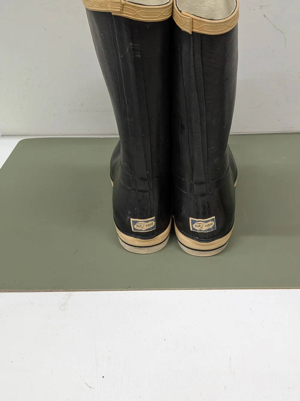 Sperry Top Siders Black Rain & Snow Boots with Cream Trim.